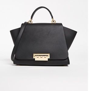 Elegant Black Handbag with Gold Accents